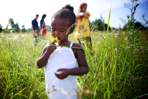 family walking in field